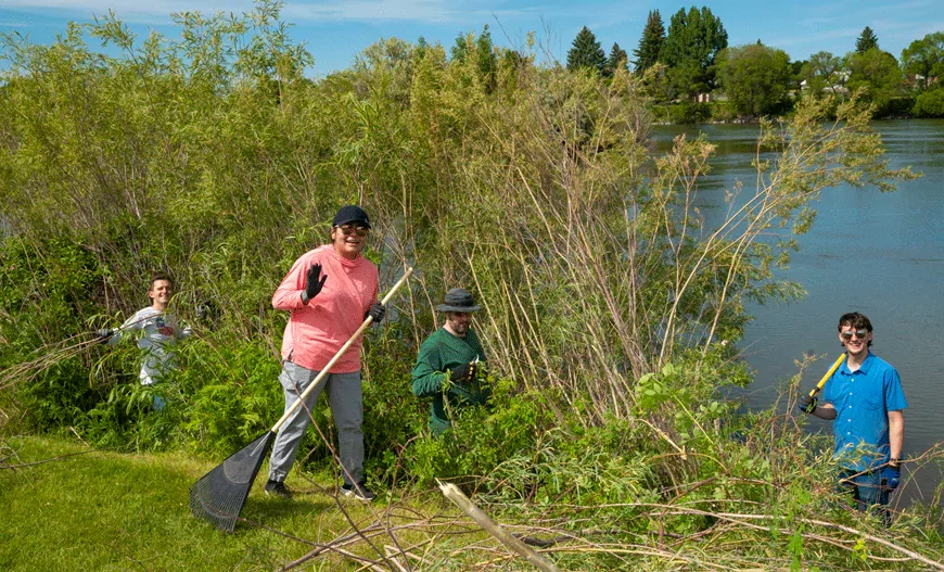 Melaleuca employees cleaning the Idaho Falls Greenbelt