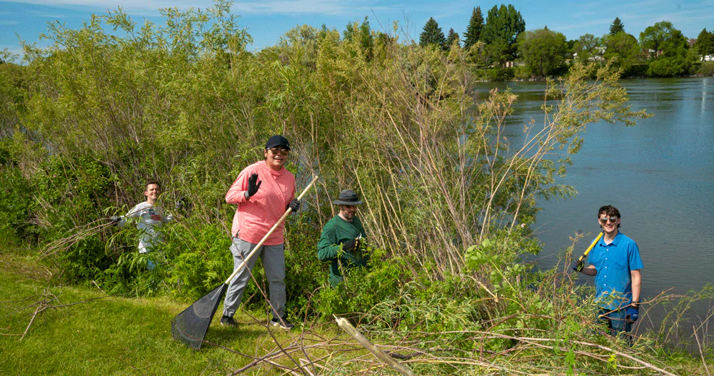 Melaleuca employees cleaning the Idaho Falls Greenbelt